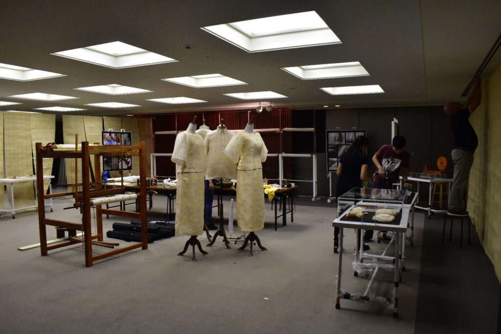 Photograph of a room being set up for exhibition