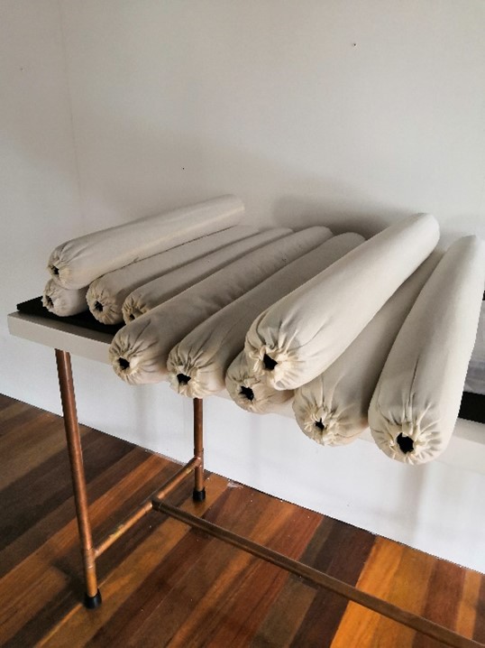 Photograph of white foam rolls on a table