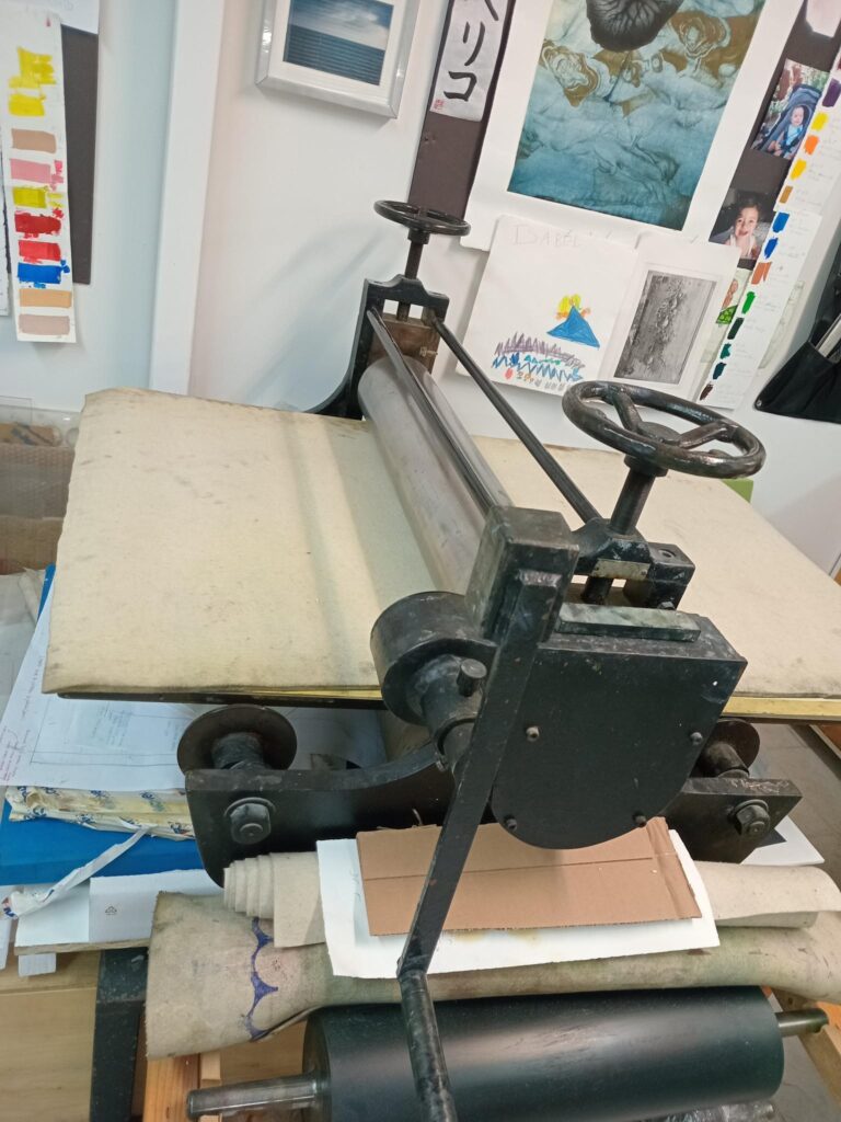 Photograph of a printing press.