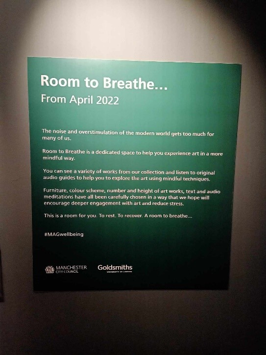 Photograph of a 'room to breathe' poster