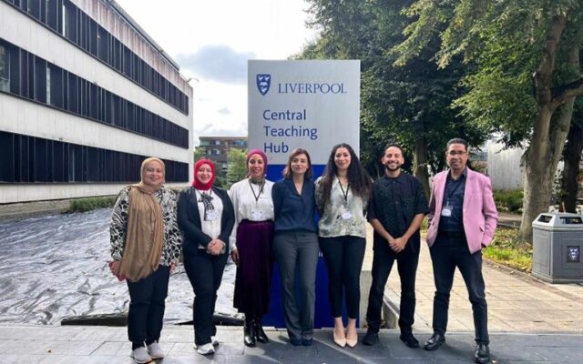 Group photo outside a university building