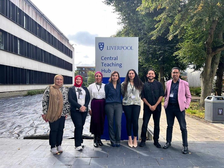 Group photo outside a university building